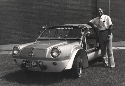 McKinley Thompson with car he designed for Africa and the Third World|