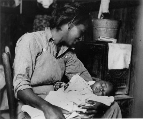 Migrant Mother Holds Her Baby