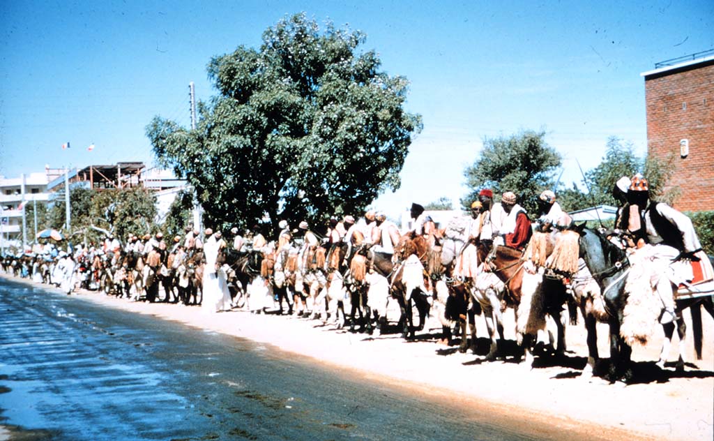 People_on_horseback_NDjamena_Chad|Market_in_N_Djamena|Downtown_Monrovia_Liberria_2009 | |