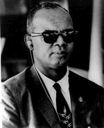 The Hon. Dr. Eric Eustace Williams|Eric Eustace Williams