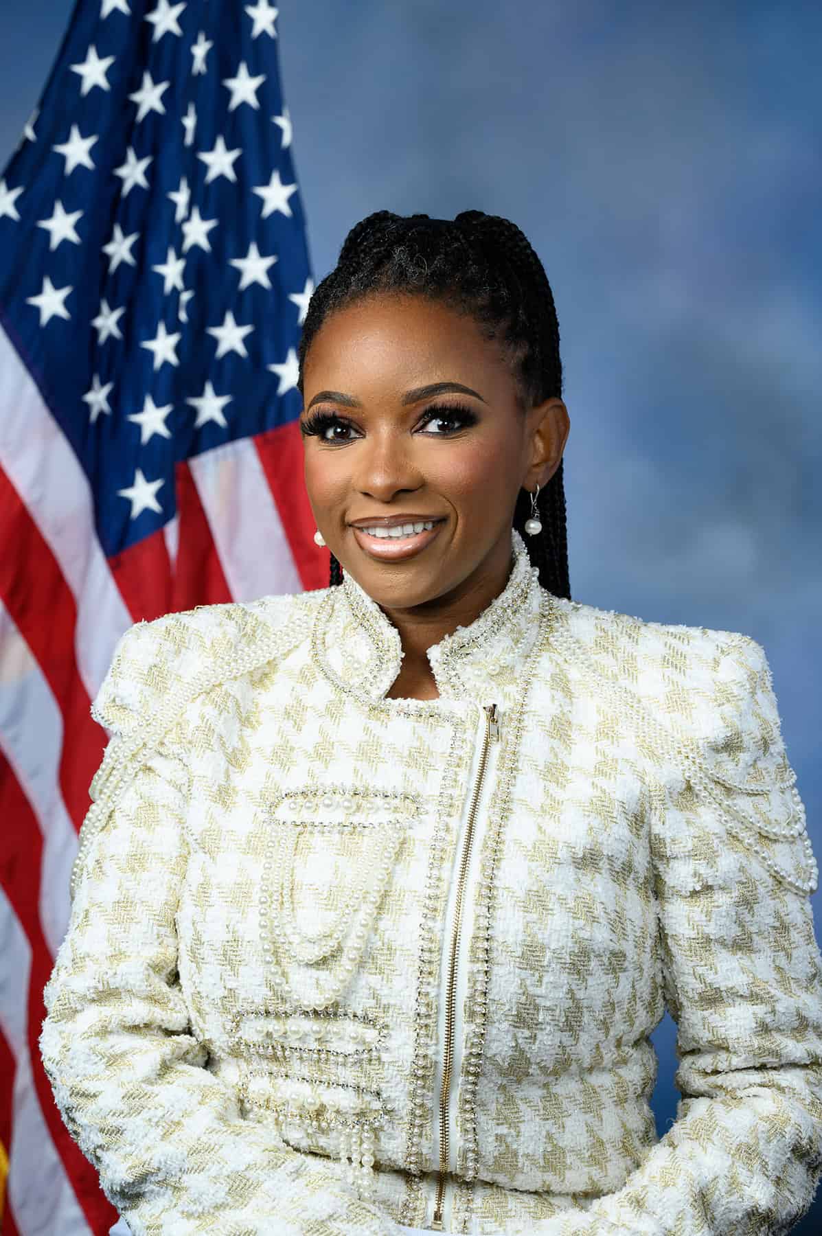 Digital Media Portraits Rep. Jasmine Crockett posing in front of American flag