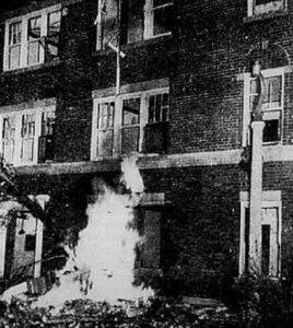 Damage to the DeRose Apartment Building (Black Then)