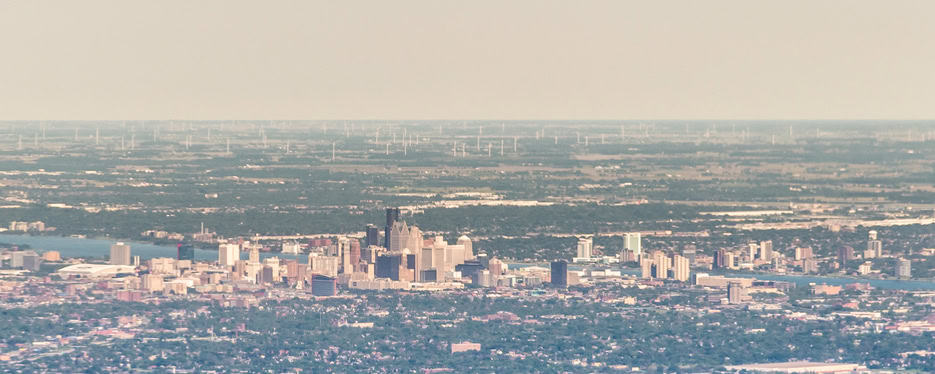 Downtown Detroit Far away view of downtown Detroit and its pollution