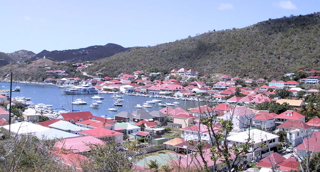 View of shops and buildings in town, Gustavia, St. Barthelemy (St. Barts) (St.  Barth), West Indies, Caribbean, Central America - Stock Photo - Dissolve