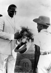 President Hamani Diori With Bouquet From Boy, March 16, 1962 (Mauritius Images)