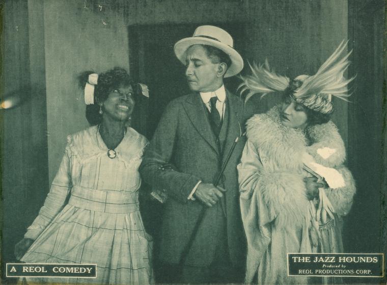 Lawrence Chenault [middle] and Edna Morton [right] in a scene from the motion picture "The Jazz Hounds", [ca.1920s].