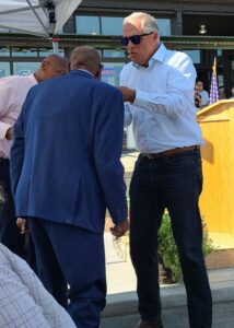 Washington Governor Jay Inslee Pinning Mayor William Craven at Ceremony Honoring the Former Mayor in Roslyn, Washingrton, August 7, 2021 (Jamila Taylor Collection)